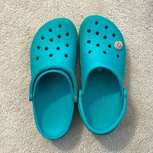 Teal crocs